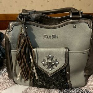 New condition Miss Me purse